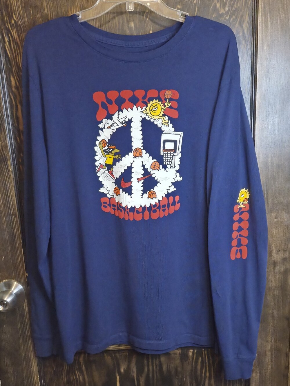 Nike Navy Long Sleeve Basketball Peace Graphic Tee with Red & Yellow Accents